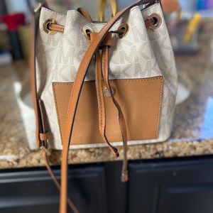 Michael Kors white monogram bucket bag